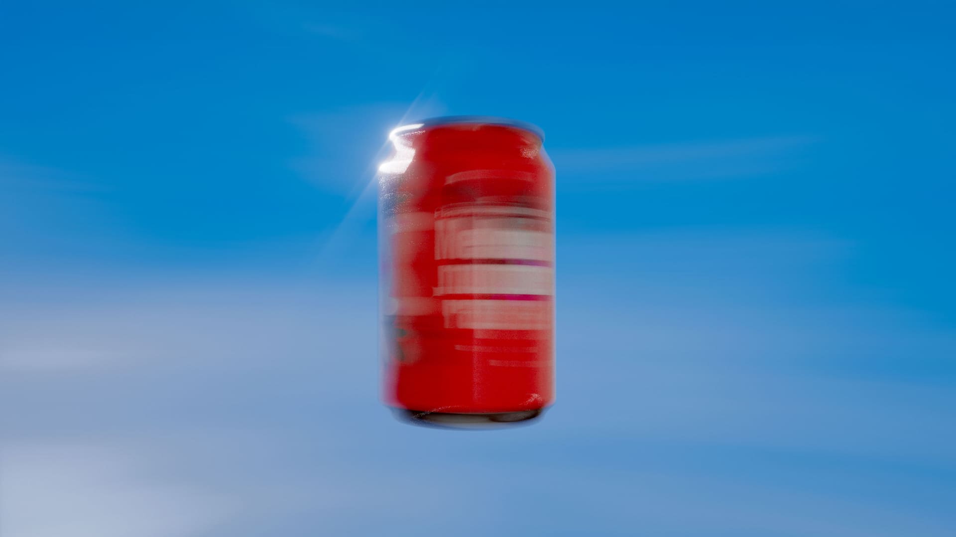 Red can spinning in a blue sky, motion-blurred